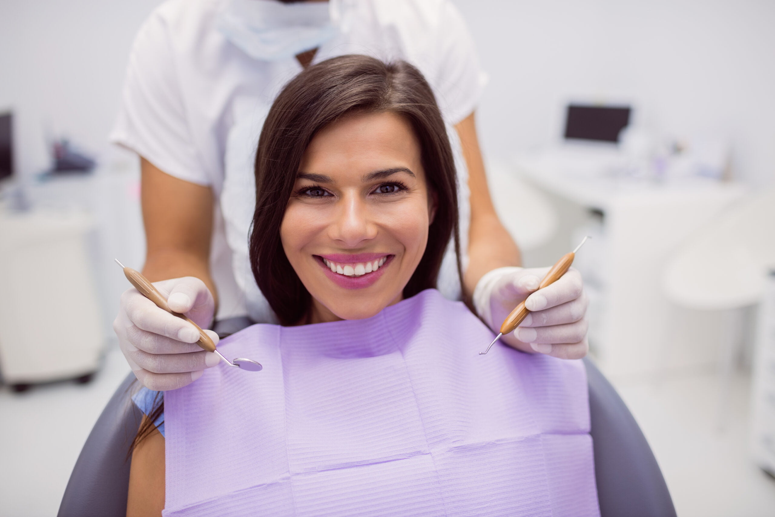 Portrait of female patient smiling in clinic